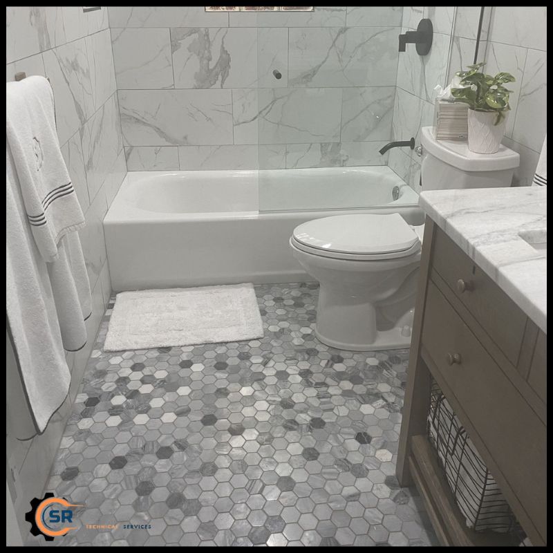 Plumbing adjustments completed during professional bathroom renovation project