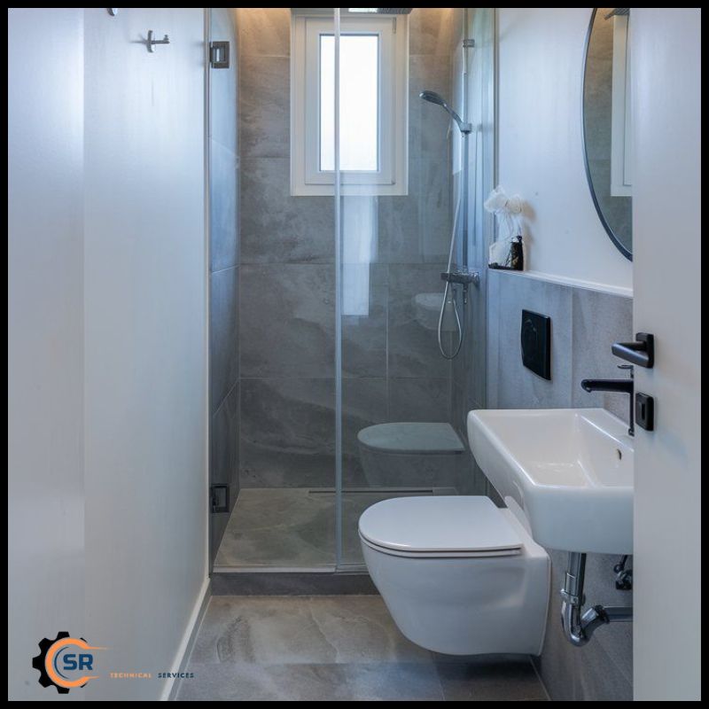 Cabinetry and storage solutions installed during full bathroom renovation